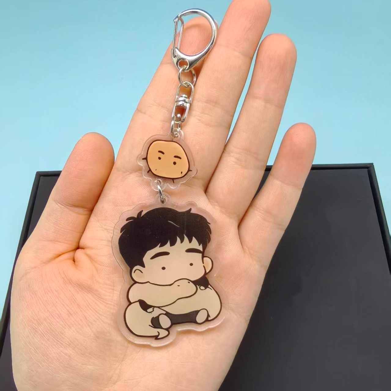 De verleiding van de heilige s - Gaming Console Keychain recensie en prijs